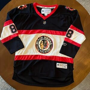Reebok NHL kids Kane Chicago Blackhawks jersey, L/XL.